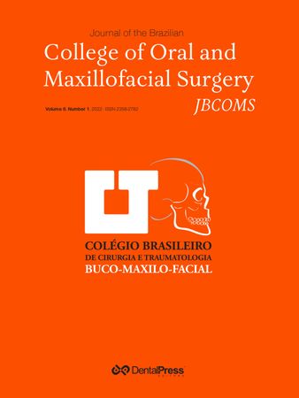 Reconstrução mandibular com prótese customizada após ressecção de ameloblastoma: relato de caso